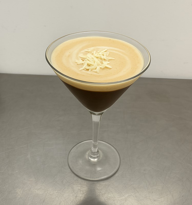 Espresso martini cocktail with creamy top